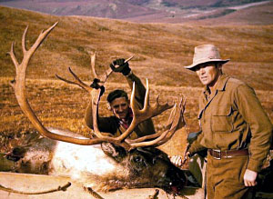 Elton and Bob Buzby Photo of Elton and Bob Buzby with caribou